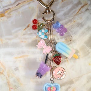 Kindle, phone or key chains w/heart adhesive.