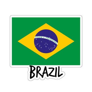 Puede incluir: Una pegatina con la bandera de Brasil. La bandera es verde con un diamante amarillo en el centro. El diamante tiene un círculo azul con estrellas blancas y el texto "ORDEM E PROGRESSO" en su interior. El texto "BRAZIL" está escrito en negro debajo de la bandera.