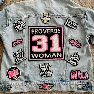 May include: A white ceramic mug with a black handle and the text "But First, Coffee" in a handwritten style. The mug is on a white surface. The mug is approximately 4 inches tall.