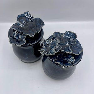 Smokey blue lidded jar with handmade flowers