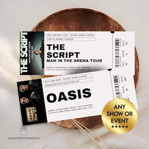 May include: Two rectangular concert tickets with black and white designs. The top ticket is for The Script Man in the Arena Tour at The O2 Arena, London, on 8th January 2027. The bottom ticket is for Oasis Live '27 at Manchester Etihad Stadium on 8th June 2027.