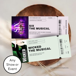 May include: Two rectangular event tickets featuring Six The Musical and Wicked The Musical. The Six ticket is purple with a group of performers, while the Wicked ticket is light green with a green-skinned character. Both include text details.