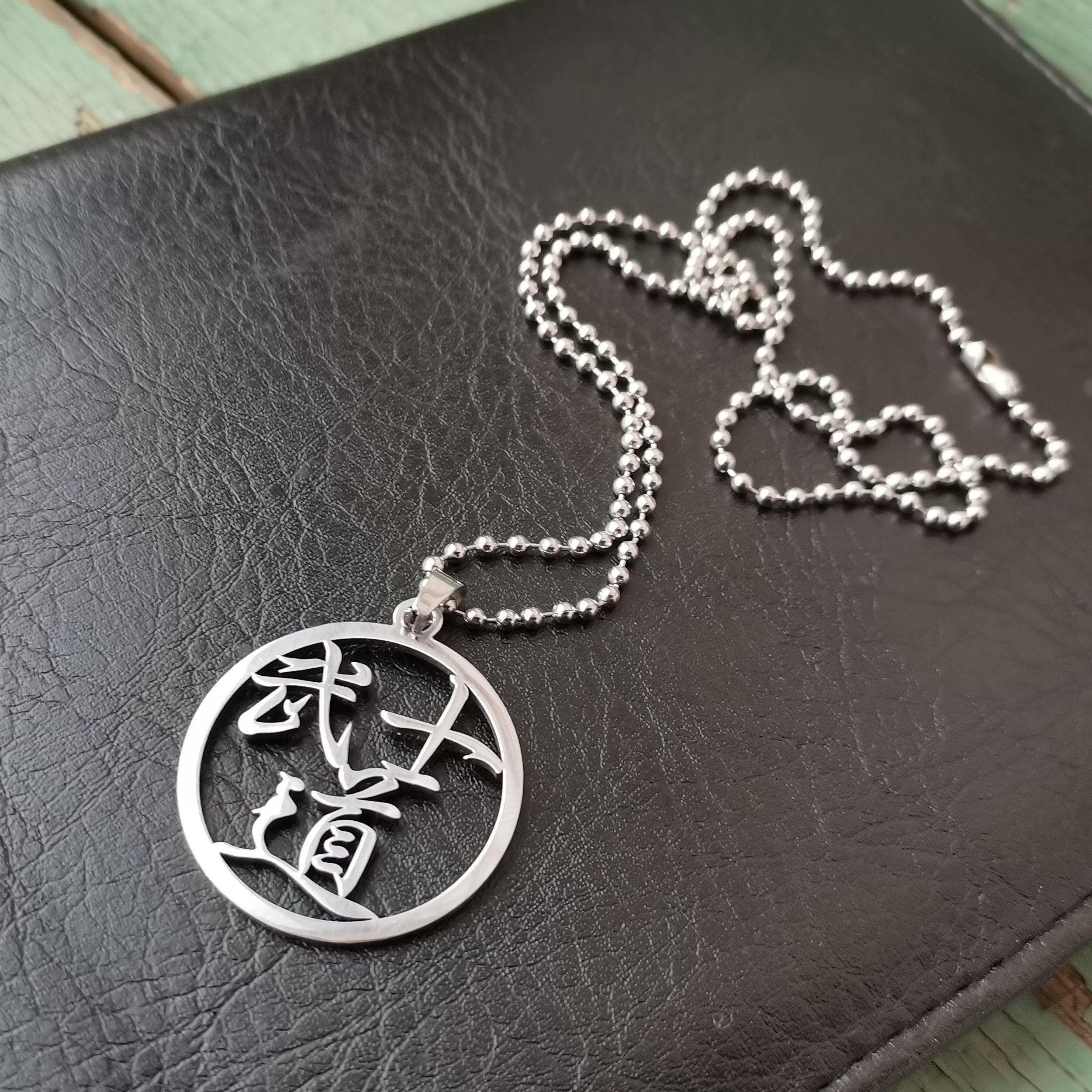 Bushido Kanji Pendant: Stainless Steel Martial Arts Necklace (US Duty Paid)