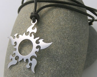 Star / Sun - stainless steel pendant on natural leather cord mens or womens art necklace.