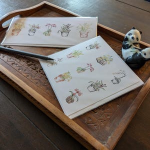 Cartão de felicitações em branco com coleção minimalista de orquídeas em aquarela - quadrado