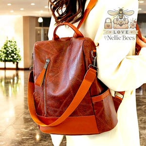 Sac à dos pour femme en cuir PU Sac en cuir souple de haute qualité Sac à dos simple à la mode Sac à dos de grande capacité Cadeau pour elle