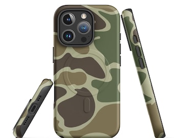 May include: A smartphone case featuring a camouflage pattern in shades of olive green, dark brown, and tan. The case displays a circular magnetic charging ring on the back, a triple-lens camera cutout, and side buttons. The set includes three views.