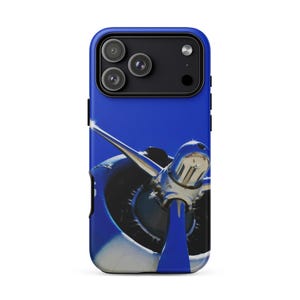 May include: A blue smartphone case featuring a graphic print of a vintage airplane propeller engine. The design displays a metallic silver nose cone and blue propeller blades against a solid blue background, covering the back of the device.