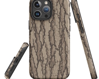 May include: A smartphone case featuring a realistic brown and tan tree bark camouflage pattern. The case is shown from three angles, displaying the back with a camera cutout, the bottom edge with speaker ports, and the side edge with button covers.