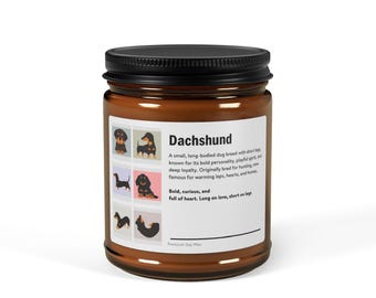 May include: A brown glass jar with a black lid, featuring a label with the word "Dachshund" and illustrations of dachshund dogs. The label also includes text describing the breed.