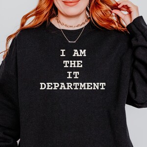 May include: Black sweatshirt with the text "I AM THE IT DEPARTMENT" in white.