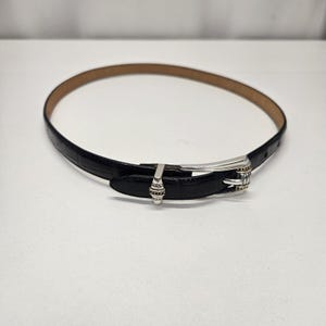 Cinturón estilo western vintage BRIGHTON para mujer, talla M 30, de cuero negro con hebilla plateada. imagen 1