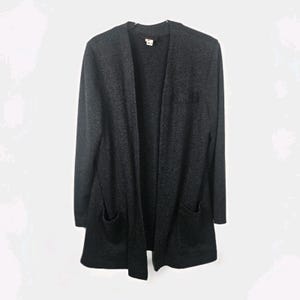 May include: A dark gray cardigan with long sleeves and two front pockets. The open-front design features a simple, classic style. The cardigan is made of a soft, textured fabric, perfect for layering.