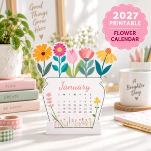 May include: A 2027 printable flower calendar featuring a white vase-shaped card with the month of January printed in red script. The top of the calendar displays colorful illustrations of orange, pink, and yellow flowers with green stems.