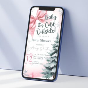 K&ouml;nnte beinhalten: Ein blaues Smartphone zeigt eine Babyparty-Einladung. Die Einladung zeigt eine rosa Schleife, Schneeflocken und einen Aquarell-Tannenbaum. Der Text lautet "Baby it's Cold Outside!" und enth&auml;lt Details zur Veranstaltung.