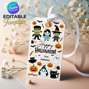 May include: A rectangular white gift tag featuring a colorful Halloween pattern with illustrations of a green monster, a witch, ghosts, pumpkins, bats, and a black cat. The text reads Happy Halloween and From: Anderson with a white ribbon attached.