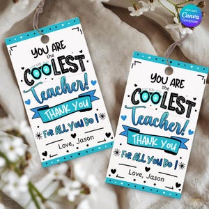 May include: Two white gift tags with the text "You are the coolest teacher!" in black and blue. The tags have a blue border and a string for hanging. The text "Thank You" is on a blue banner. The tags are decorated with hearts and stars.