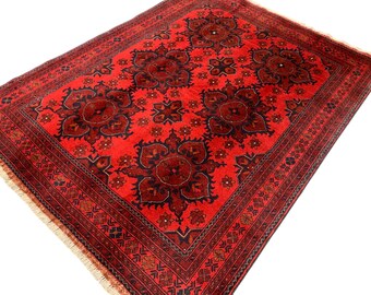 Handmade Afghan Wool Rug: 4'11 x 6'6 Red Persian Style Carpet