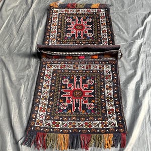 Antique Saddle Bag Rug • Handmade Tribal Saddle Rug • Vintage Wool Saddle Mat • Rustic Horse Saddle Decor • Unique Artisan Saddlebag Design