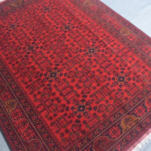 Handmade Afghan Bukhara Khal Mohammadi Rug 4&#39;11x6&#39;6 ft | Authentic Red Wool Oriental Rug | 149x198cm Nomadic Tribal Decor for Living Room