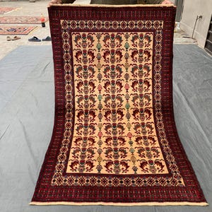 Handmade Afghan Baluch Rug 4x6: Beige Floral Wool, Vintage 1970s