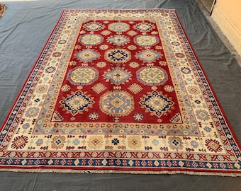 Handmade Afghan Kazak Wool Rug: 6x9 Red Geometric Boho Rug