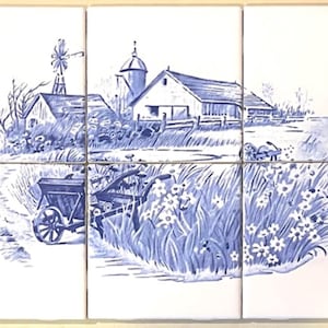 May include: A set of six ceramic tiles featuring a blue and white pastoral scene. The artwork depicts a farmhouse, windmill, and a field of flowers. The tiles are arranged together to form a larger image, with decorative corner accents.