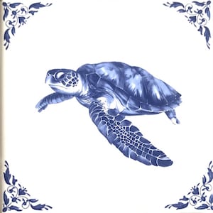 May include: Square ceramic tile featuring a detailed illustration of a sea turtle in shades of blue. The turtle is centered on a white background, with decorative floral corner accents in blue.