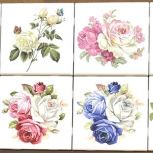 May include: A set of eight square white ceramic tiles, each featuring a distinct botanical illustration of roses. The designs include clusters of red, pink, white, and blue roses with green leaves, arranged in various floral compositions on each tile.