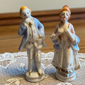Colonial figurines, made in Occupied Japan