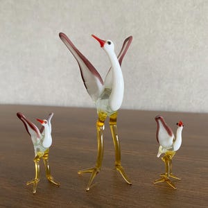 Vintage Handcrafted Glass Stork Figurines: 1970s Family Collection