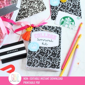 May include: A college survival kit with a black and white composition notebook design, featuring the text "COLLEGE Survival Kit". The kit is decorated with a smiley face charm, pink ribbons, and a tassel. Also includes a Sephora gift card and pencils.