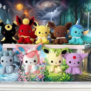 May include: A collection of nine crocheted plush figures featuring various creatures with large black eyes, distinct ear shapes, and colorful yarn bodies including black, red, yellow, brown, blue, light blue, pink, cream, and purple tones.