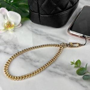 Correa de muñeca de lujo para funda de teléfono: Cadena de calidad de joyería con asa de mano