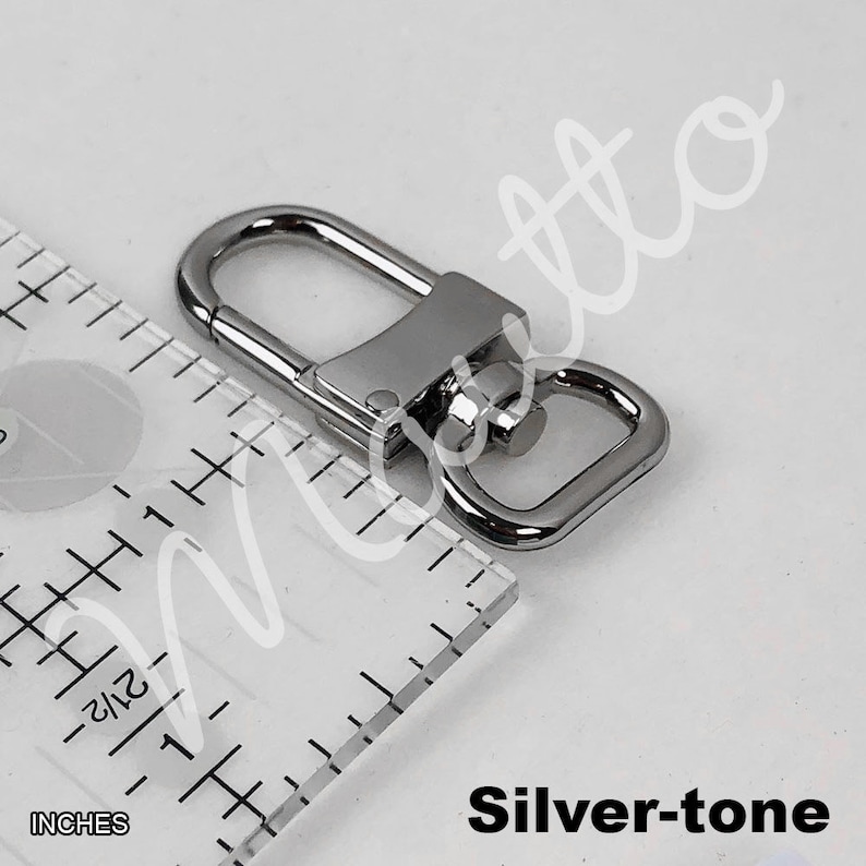 Silver-tone swiveling U-shape clip design.