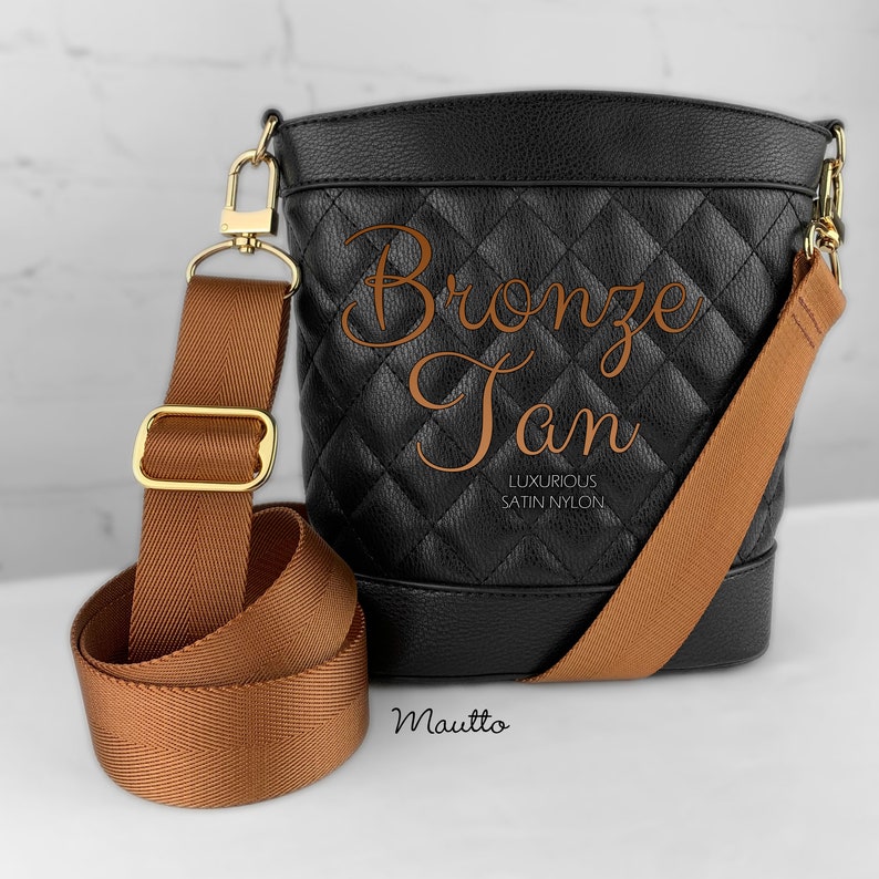 Photo of dark tan woven purse strap on purse. Adjustable shoulder to cross body length.