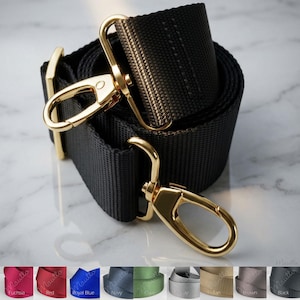 Extra wide, guitar-style strap for handbags and purses. Soft and thick nylon material with heavy duty hardware. Adjustable from shoulder to cross body positions. Colors from black, brown, navy, fuchsia, red, blue and more. Made by hand in the USA.
