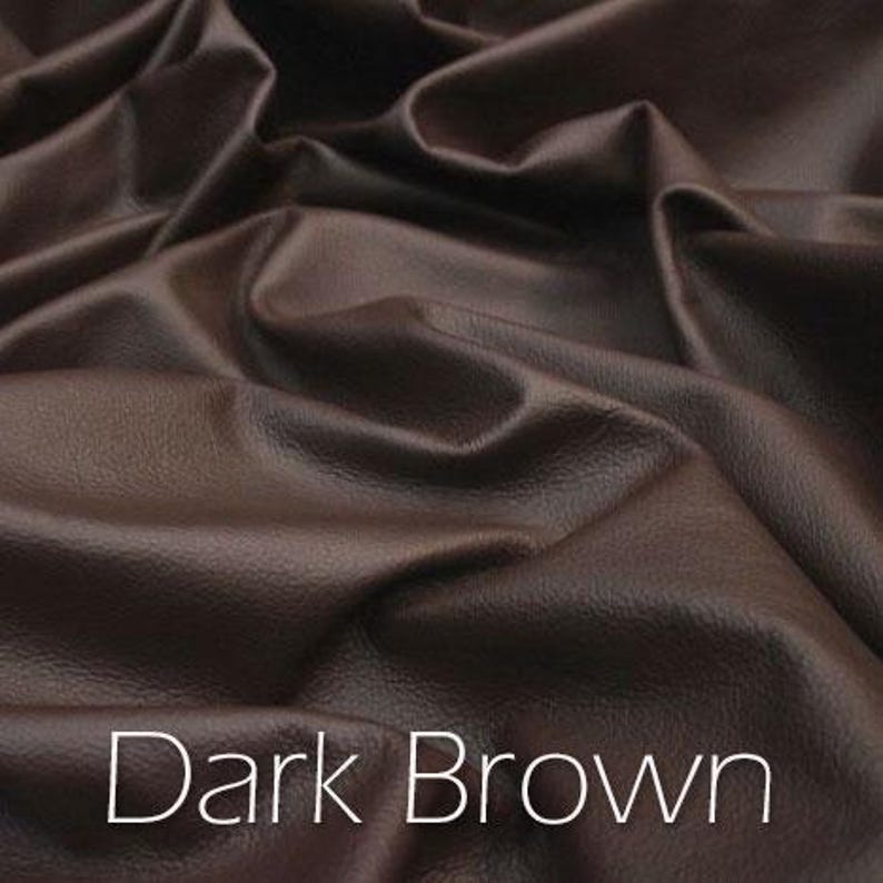 Photo of dark brown genuine leather hide.