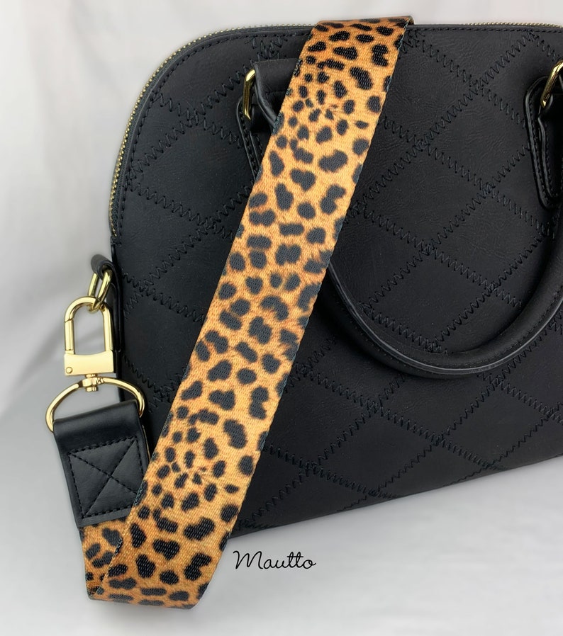 black bag with leopard print strap