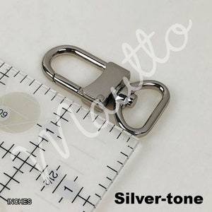 Silver-tone U-shape clip in U-shape design.