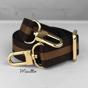 Photo of DE colorway fabric strap with gold clips. Petite size fabric strap.