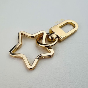 Stern Schlüsselanhänger: Gold oder Silber Taschenanhänger, Taschenbaumler, Rucksack-Accessoire
