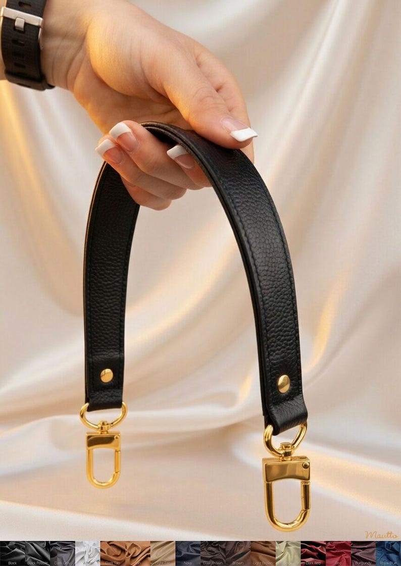 Tapered width short shoulder or crook of arm strap. Choice of genuine leather and clip/hook style. Shown with gold hardware.