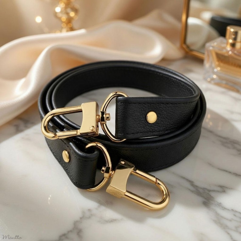 Photo of black pebbled textured leather strap for handbags of all sizes.