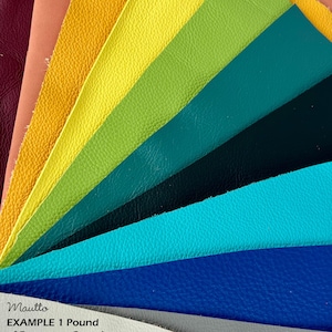 Colorful leather scraps and remnants in red, orange, yellow, green, light blue, dark blue, beige and more.