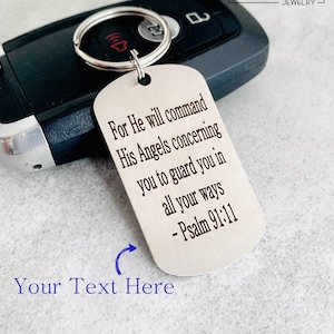 May include: Silver keychain with a quote from Psalm 91:11, "For He will command His Angels concerning you to guard you in all your ways - Psalm 91:11". The keychain has a space for personalized text.