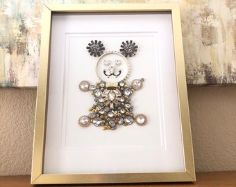 11”x14” Gold frame with white double matting around a Gold and Rhinestone Jewelry Bear holding a Diamond.