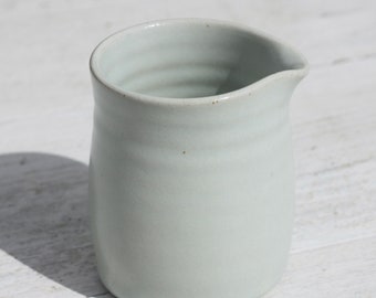 100ml Milk Jug in Pale Mint Green glaze Hand thrown