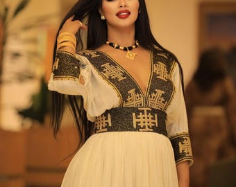 black and gold ethiopian dress Black and gold habesha dress