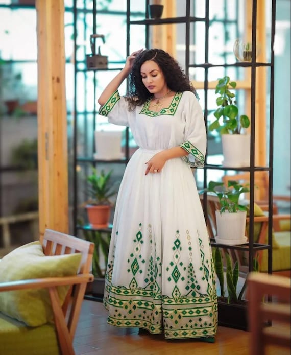 Modern Habesha Kemis: Ethiopian Dress with Green Tibeb Embroidery